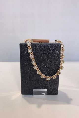 Black clutch with gold detail