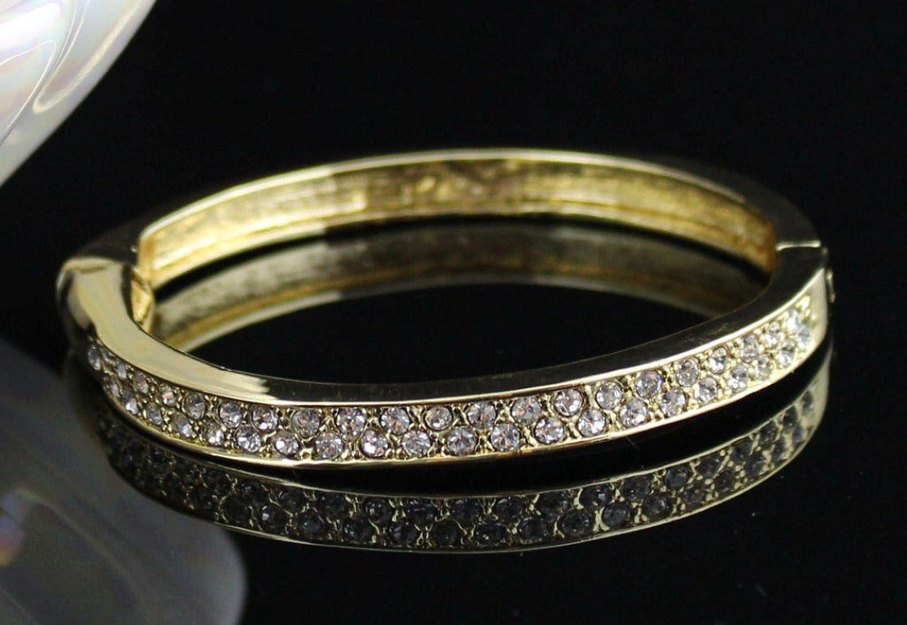 Gold and diamonte bangle - ST1454